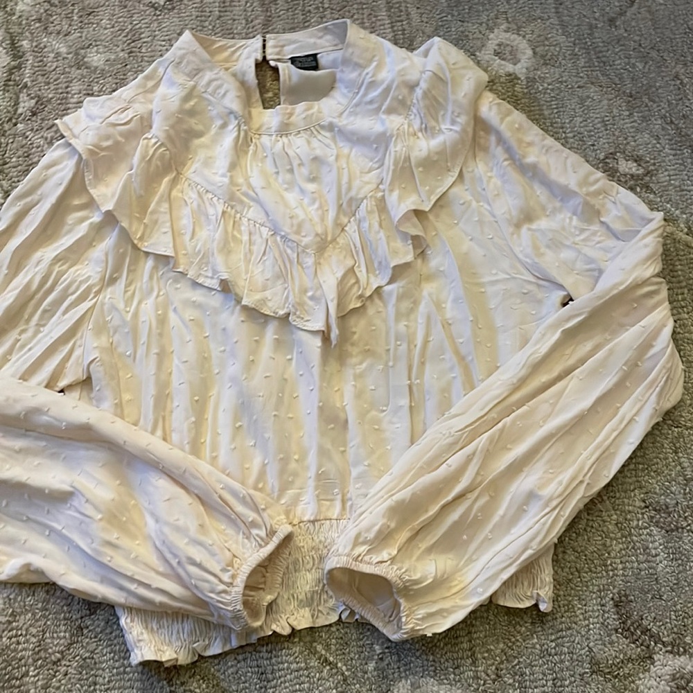 women’s cream colored dress top